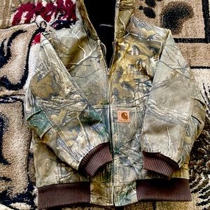 Carhartt Jacket. Small hole in arm See photo